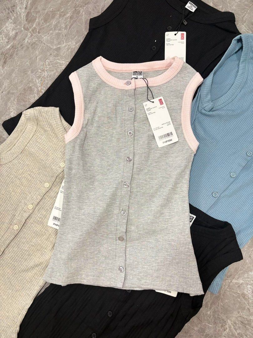 Uniqlo Ribbed Button-Down Tank Tops (Category: Sleeveless) located in Quezon City. Submitted by ylaisahbaguino (Listing ID 1467937879, Image 2). Description: - Brand: Uniqlo - Style: Ribbed tank top with front button details - Material: Soft cotton, sleeveless cut - Condition: Brand new with original tags (PHP 590 printed price) - Available Colors: Blue, yellow, red stripe, white, grey, black, pink, and burgundy - Available Sizes: S, L, and XL - 
