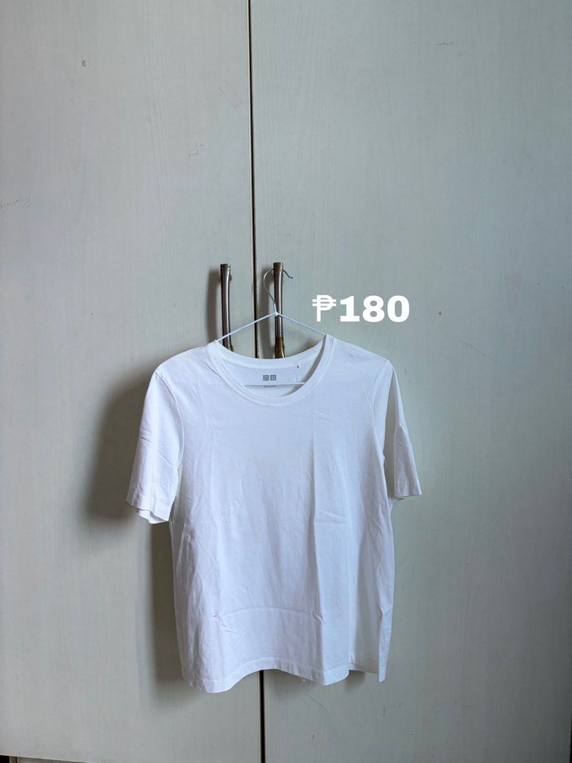 Uniqlo U White T-Shirt (Category: Shirts) located in Sariaya. Submitted by starstore.ph (Listing ID 1467889340, Image 1). Description: mop: gcash/maribank mod: jnt/lalamove/grab/meetup (mandaluyong or makati only) - Brand: Uniqlo U collection - Color: Classic plain white - Style: Crew neck, short sleeves, standard fit - Material: Soft and breathable cotton - Versatile: Clean, minimal design that goes with everything - Condition/Use: Perfect and e