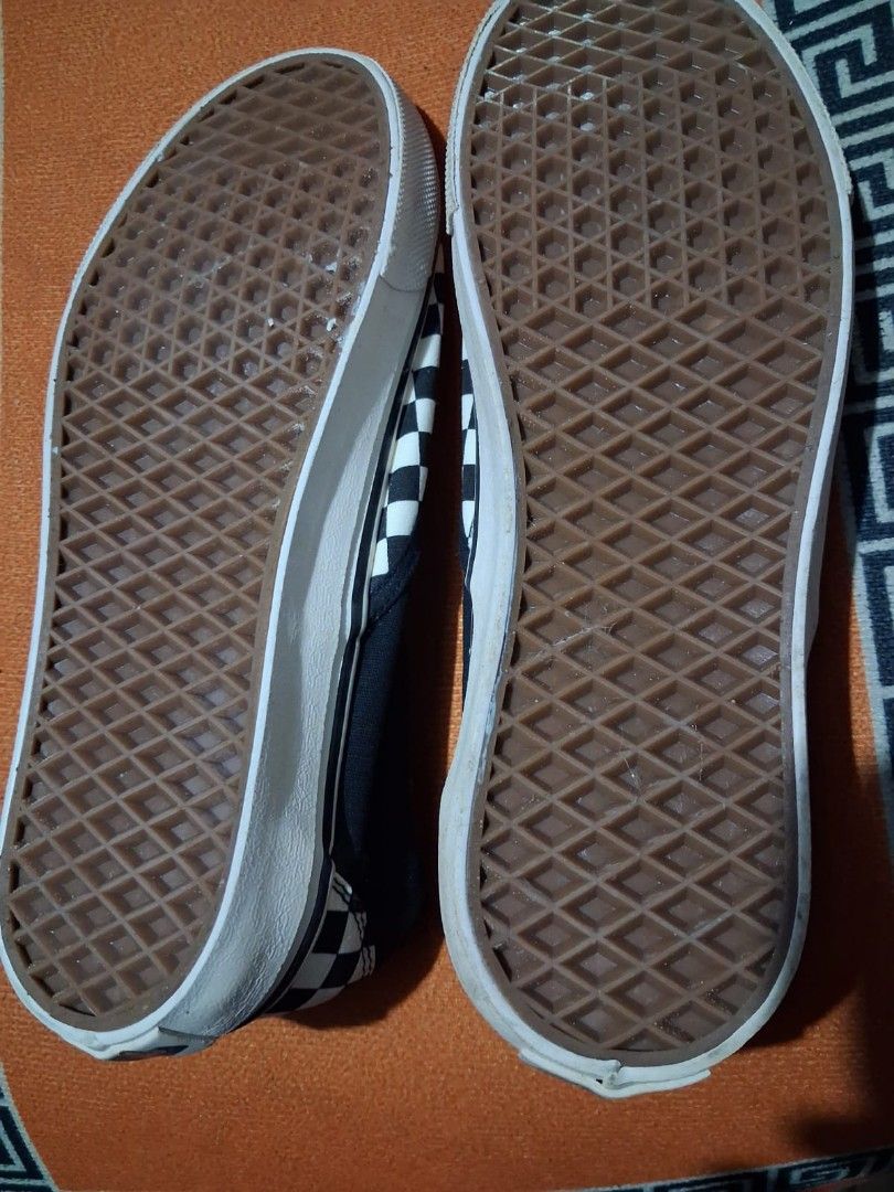 Vans Classic Slip-On Checkerboard Shoes (Category: Casual Shoes) located in Mandaluyong City. Submitted by jowwn (Listing ID 1467962497, Image 2). Description: Black and white checkerboard pattern, iconic slip-on skate shoe design. Canvas upper with elastic side accents. Classic waffle rubber outsoles. Original red tag attached, unworn condition. Great everyday sneakers, easy to match with any outfit..