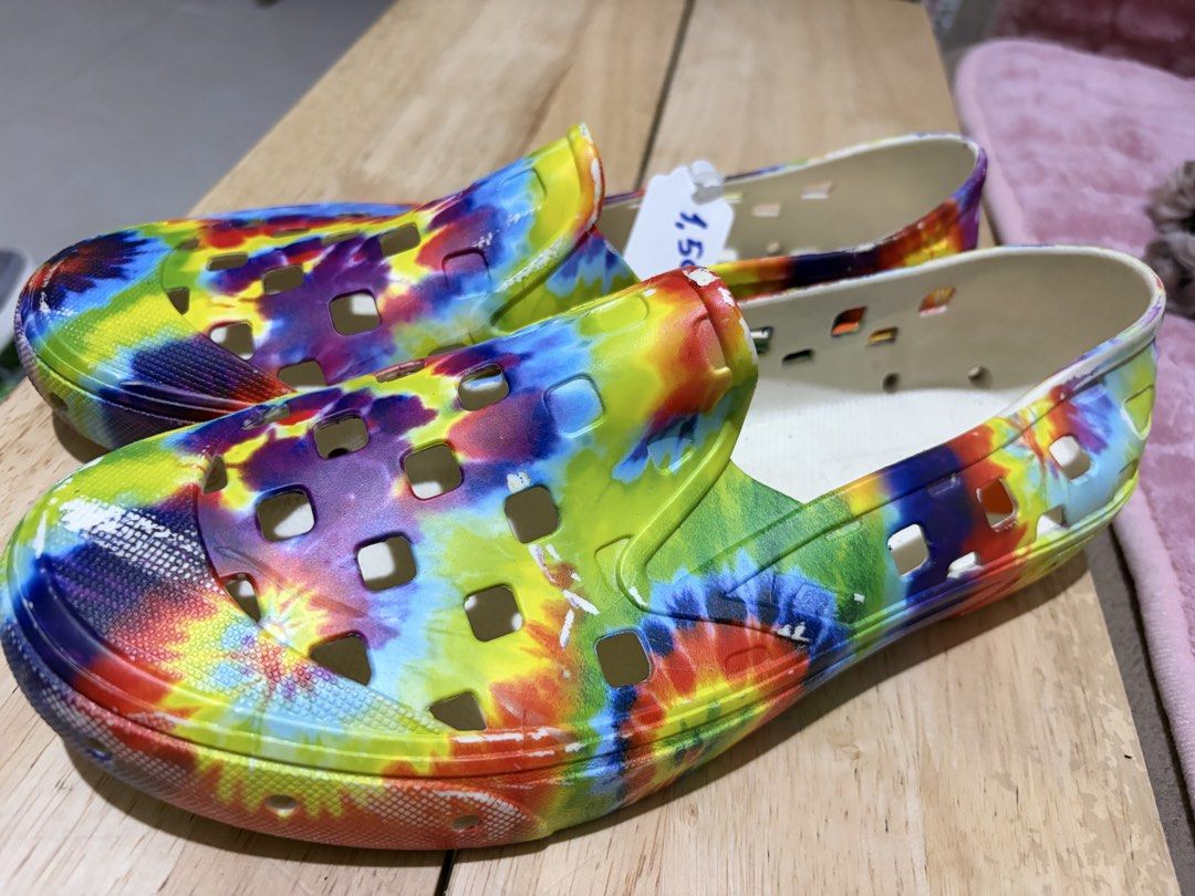 Vans Tie-Dye Slip-On Surf Shoes (Category: Sneakers) located in Paranaque City. Submitted by greatfinds108 (Listing ID 1467873836, Image 3). Description: - Brand: Vans (Slip-on surf shoes) - Condition: Brand new with price tag attached - Design: Vibrant all-over tie-dye pattern - Comfort: Perforated cutouts for breathability and white interior lining - Best for: Easy casual wear, summer, and beach days For pick up only.