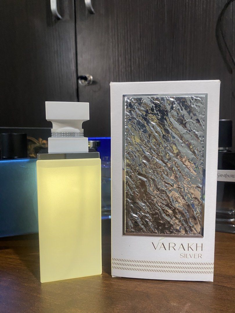 Varakh Silver Eau de Parfum with Box (Category: Fragrance & Deodorants) located in Mayantoc. Submitted by gabchive (Listing ID 1467924427, Image 2). Description: - Authentic Varakh Silver fragrance - Comes with original white and silver box - Stunning bottle design with textured silver foil and rhinestone band on cap - Barely used (sprayed a couple of times only, liquid level still full) - Reason for selling: Decluttering.