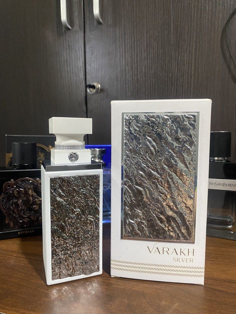 Varakh Silver Eau de Parfum with Box (Category: Fragrance & Deodorants) located in Mayantoc. Submitted by gabchive (Listing ID 1467924427, Image 1). Description: - Authentic Varakh Silver fragrance - Comes with original white and silver box - Stunning bottle design with textured silver foil and rhinestone band on cap - Barely used (sprayed a couple of times only, liquid level still full) - Reason for selling: Decluttering.