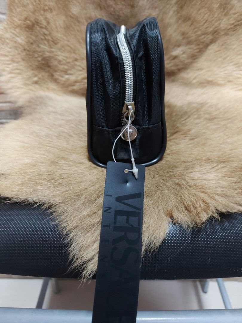 VERSACE intensive nylon pouch (Category: Belt bags, Clutches and Pouches) located in Quezon City. Submitted by threetwotwo2ndaccount (Listing ID 1467873401, Image 2). Description: Versace intemsive nylon pouch made in italy good as new size: H-5",L-9",W-3" unused bawal sa maselan bawal sa barat.