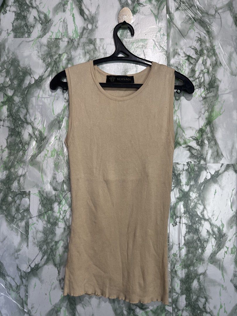 VERSACE knitted top (Category: Luxury Apparel) located in Bulacan. Submitted by letsfindukaywithme (Listing ID 1468051329, Image 2). Description: Versace Knitted top Size 40 Best fit small-medium Knitted strechable 11x23" Like new No issue +sf payment first Ship via J&T .