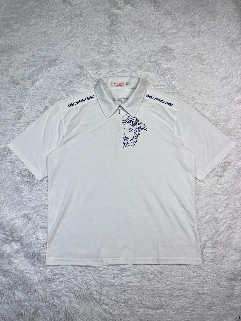 VERSACE POLO Q-ZIP (Category: Tshirts & Polo Shirts ) located in Manila. Submitted by bagayanagi11491 (Listing ID 1467901629, Image 1). Description: Excellent Condition Size: L-XL Dimes: 23x28 Issue: None The best to pang alis.