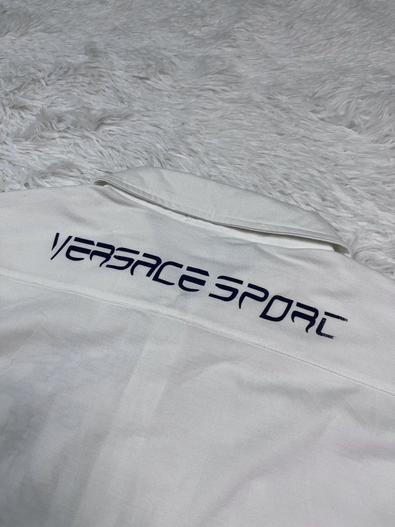 VERSACE POLO Q-ZIP (Category: Tshirts & Polo Shirts ) located in Manila. Submitted by bagayanagi11491 (Listing ID 1467901629, Image 3). Description: Excellent Condition Size: L-XL Dimes: 23x28 Issue: None The best to pang alis.