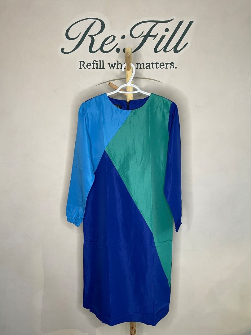Verve Colorblock Long Sleeve Dress (Category: Dresses) located in Taguig. Submitted by re.wear.mnl (Listing ID 1468007742, Image 1). Description: - Style: Colorblock geometric panel design - Colors: Blue, green, and royal blue - Details: Long sleeves, round neckline, back zipper closure - Length: Mid-length - Fabric: Smooth texture, vibrant everyday piece.