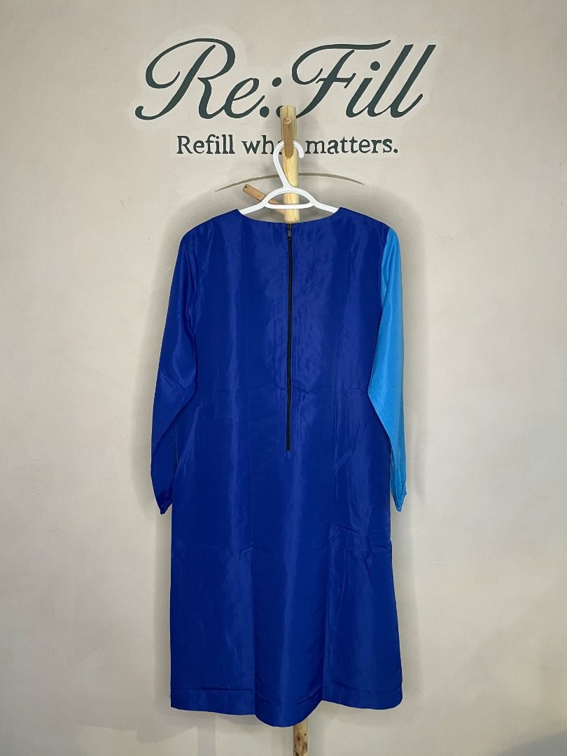Verve Colorblock Long Sleeve Dress (Category: Dresses) located in Taguig. Submitted by re.wear.mnl (Listing ID 1468007742, Image 2). Description: - Style: Colorblock geometric panel design - Colors: Blue, green, and royal blue - Details: Long sleeves, round neckline, back zipper closure - Length: Mid-length - Fabric: Smooth texture, vibrant everyday piece.