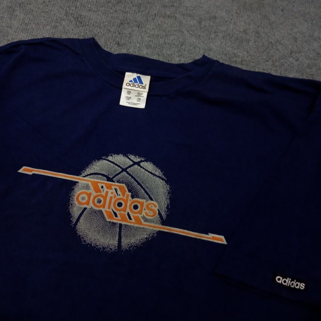 Vintage 1990s Adidas Tshirt (Category: Activewear) located in Taguig. Submitted by sito. (Listing ID 1467879031, Image 2). Description: For sale! 📣 Vintage 1990s Adidas Tshirt Specs and measurements: • Size XXL • Length 33 inches • Width 30 inches Condition Details: • Used Condition • minimal crack print • Color rate: 9.5/10 • Overall Condition: 9/10 Price: ~ ₱560 Transaction Details: Location: Upper Bicutan, Taguig City, Metro Manila, 1633 Paym