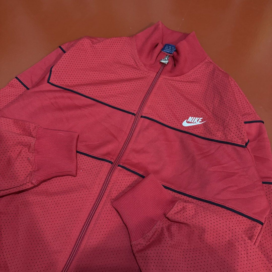 VINTAGE 80'S NIKE TRACK JACKET (Category: Coats, Jackets and Outerwear) located in Pasig City. Submitted by buzzthrifty (Listing ID 1468004348, Image 2). Description: SIZE S-M 20x23 EXCELLENT CONDITION 3PCS AVAIL .