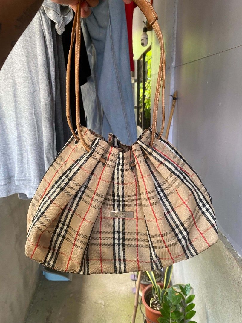 Vintage Burberry nova check drawstring bag (Category: Sling Bags) located in Borongan. Submitted by thrift-real2.0 (Listing ID 1467955656, Image 1). Description: vintage Burberry Nova chech drawstring bag excellent condition color rate:9.5/10 no issue 1500 plus sf.