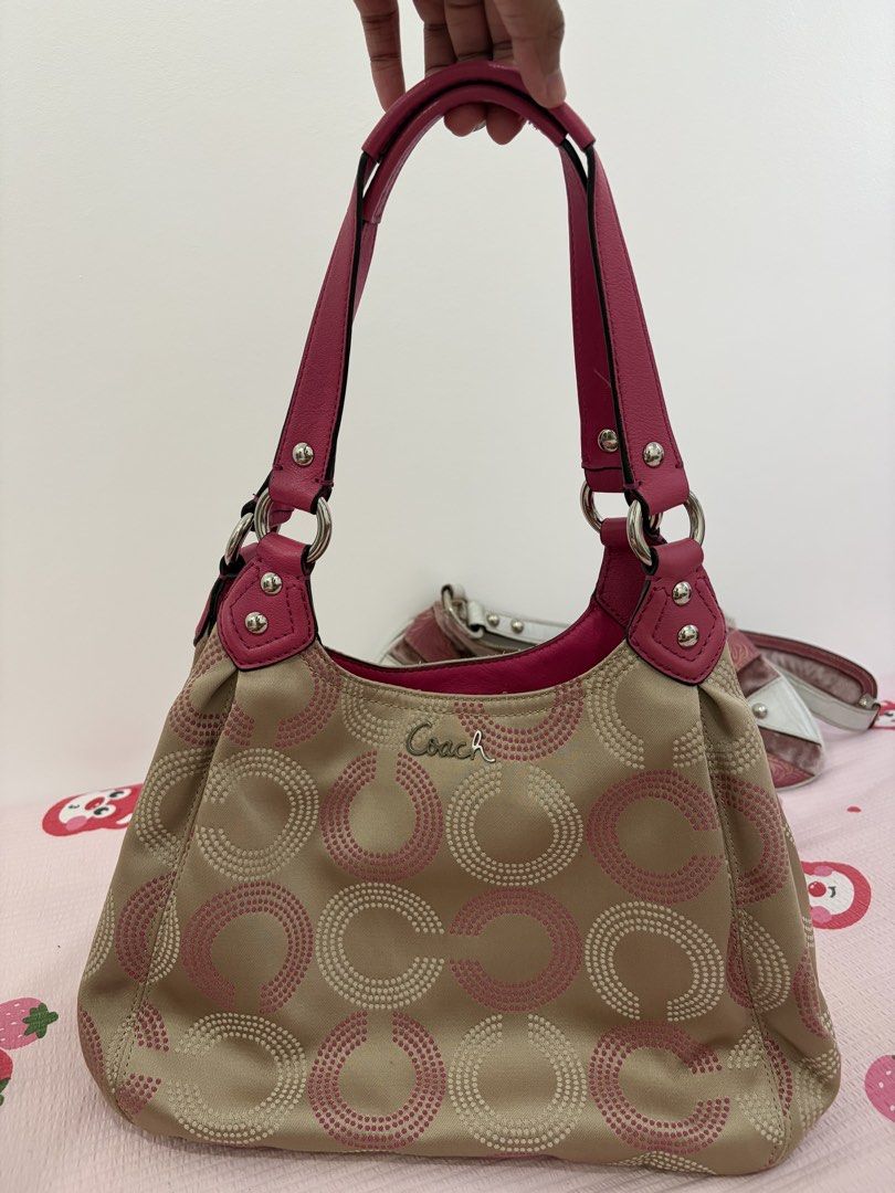 vintage coach small madison maggie (Category: Luxury Bags & Wallets) located in Pila. Submitted by raydltre (Listing ID 1467954702, Image 1). Description: - Brand: Coach - Model: Small Madison Maggie - Color: Khaki / Beige with Pink Dotted C Print & Hot Pink Leather Trim - Hardware: Silver-tone - Design: Shoulder bag with multiple spacious compartments and secure zip/snap closures - Condition: Excellent vintage condition, well-maintained - Perfec