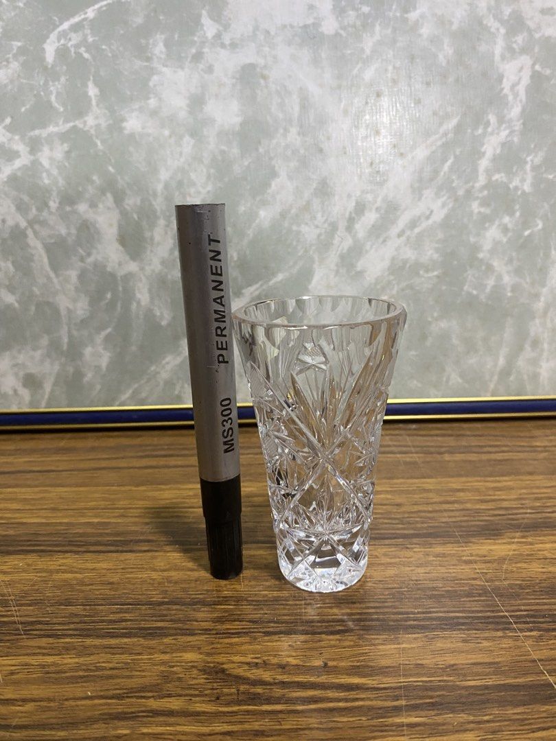 Vintage cut-crystal bud vase (Category: Vases & Decorative Bowls) located in Calamba. Submitted by chebvintagedepot (Listing ID 1467936581, Image 3). Description: (B26-02) Vintage clear cut-crystal bud vase featuring a traditional star and diamond pattern. The faceted design catches the light nicely and gives the vase a classic look. Suitable for displaying a single flower or as a decorative piece on a shelf, side table or windowsill. Measurement
