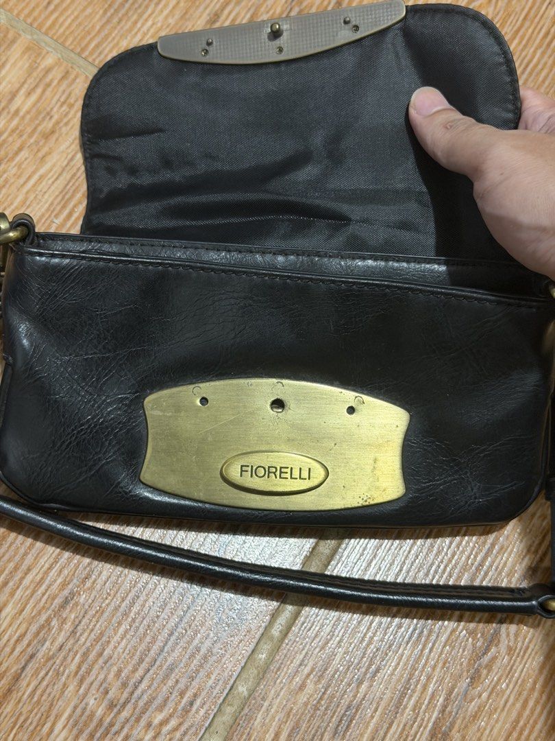 Vintage Fiorelli Mini Shoulder Bag (Category: Shoulder Bags) located in Caloocan City. Submitted by guiditwoshoes (Listing ID 1467973347, Image 2). Description: Fiorelli Mini Shoulder Bag Antiqued brass metal closure and buckles Excellent, aside from wear in brass hardware MOP: Gotyme / GCash Via J&T Express, Lalamove, Grab (Buyer shoulders fee).