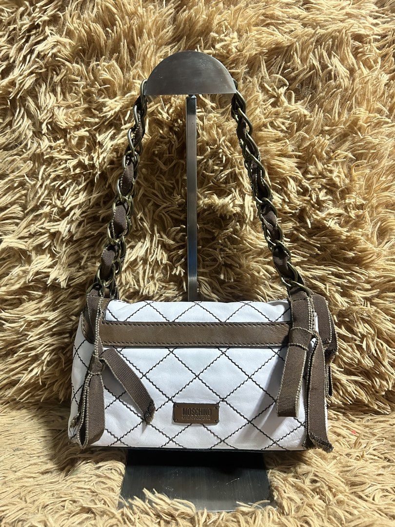 Vintage Moschino Kili Bag (Category: Luxury Bags & Wallets) located in Iloilo. Submitted by thrift-to-thrift-ukay (Listing ID 1467968003, Image 2). Description: Authentic/Legit Vintage Moschino Kili Bag Size Small Rank Ab Condition 9.8/10 .