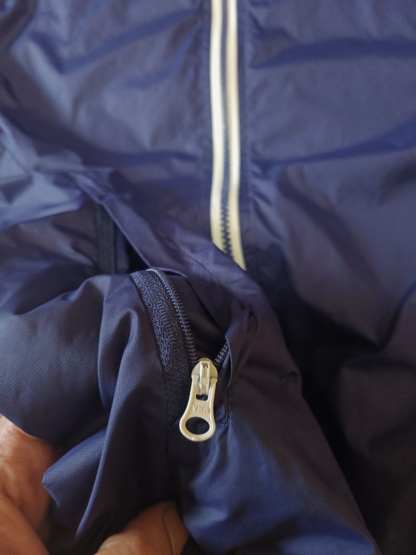 Vintage Nike Windbreaker (Category: Coats, Jackets and Outerwear) located in Cavite. Submitted by south.loot (Listing ID 1467899486, Image 3). Description: Vintage Nik windbreaker jacket Ykk zippers Size S-M Length 26.5 Width 22 Good to excellent condition.