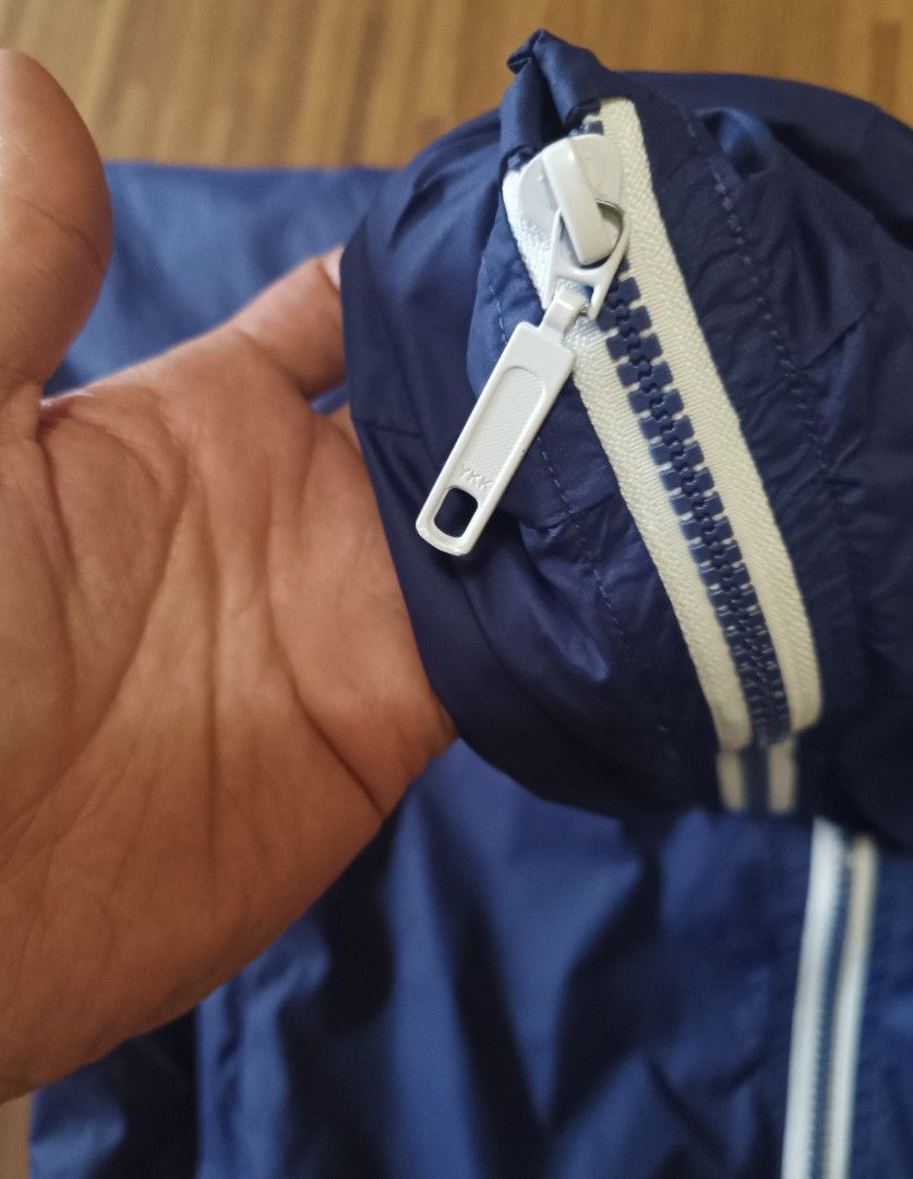 Vintage Nike Windbreaker (Category: Coats, Jackets and Outerwear) located in Cavite. Submitted by south.loot (Listing ID 1467899486, Image 2). Description: Vintage Nik windbreaker jacket Ykk zippers Size S-M Length 26.5 Width 22 Good to excellent condition.
