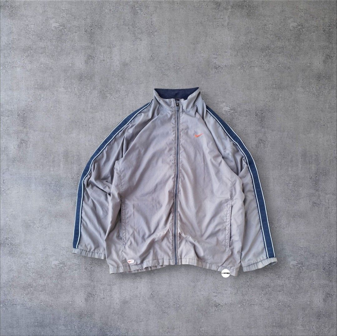 Vintage Nike Windbreaker Track Jacket Embroidered (Category: Coats, Jackets and Outerwear) located in Pasig City. Submitted by j.ownerss (Listing ID 1467920932, Image 1). Description: FOR SALE‼️ VINTAGE NIKE WINDBREAKER TRACK JACKET‼️ ₱800 ONLY (FROM 850) Logo Embroidered Full zip Logo engraved in zip puller With pockets Double lining Condition: 9/10 Flaws: needs wash only Dimensions: 22 x 26/27 Pickup: Allegra Garden Place Pasig Delivery via Lal