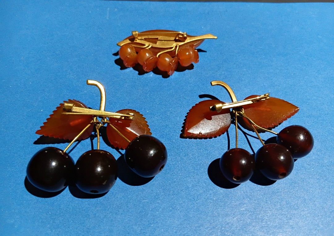 Vintage russian amber brooches bundle (Category: Other Accessories) located in Quezon City. Submitted by threetwotwo2ndaccount (Listing ID 1467912671, Image 2). Description: Vintage Russian Amber brooches bundle 3pcs 2pcs russian amber cherries brroch/pin 1pc russian amber lilly of the valley brooch/pin with marking not sire if 9k or 10k gold no inclusion bawal sa maselan bawal sa barat.