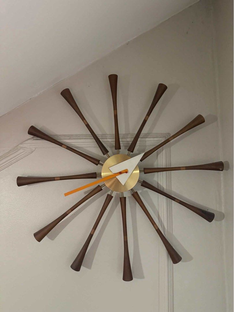 Authentic Vitra Spindle Clock by George Nelson – Excellent Condition (Category: Clocks) located in Mandaluyong City. Submitted by olachicoas (Listing ID 1467846776, Image 2). Description: Up for sale is an authentic Vitra Spindle Clock, designed by George Nelson. This iconic mid-century modern piece features turned solid walnut spindles, a brushed brass central hub, and signature geometric hands. It has been kept stored safely in the attic and re