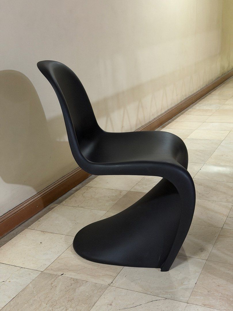 Vitra Panton Chair (Category: Chairs) located in Quezon City. Submitted by dailydeclutter (Listing ID 1467924097, Image 3). Description: Height (in): 35¼ Width (in): 19¾ Depth (in): 23½ Seat Height (in): 16¼ Seat Width (in): 19¼ Seat Depth (in): 18 - Authentic Vitra Panton Chair from an authorized dealer - Iconic modern cantilever design in a sleek black matte finish - Standard dining height, perfect for modern dining spaces - Sturdy molded plast