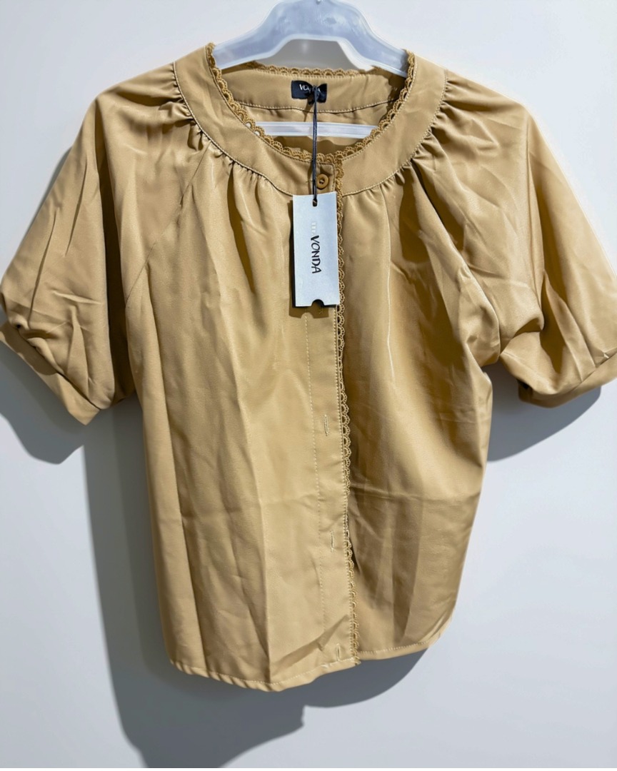 Vonda Brown Puff Sleeve Top (Category: Blouses) located in Marikina City. Submitted by visionfinds (Listing ID 1468021709, Image 1). Description: Brand New w Tag Needs ironing. Fits M-L.