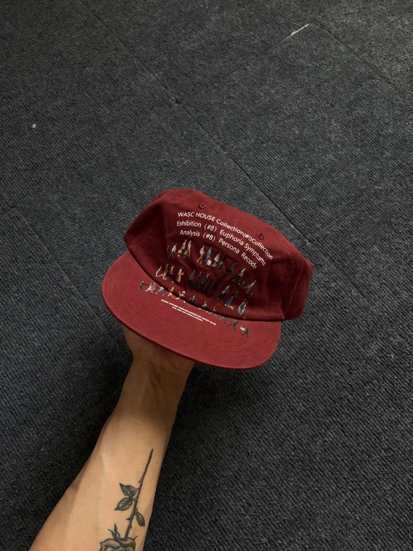 WASC House Collection Maroon Cap (Category: Caps & Hats) located in Manila. Submitted by toys_hats005 (Listing ID 1467956512, Image 1). Description: - Brand: WASC House Collection - Color: Maroon with white graphic print - Material: 100% cotton interior with a comfortable black sweatband - Fit: Adjustable strap closure with a silver-tone metal buckle - Condition: Clean fabric, shape retainer insert still inside.