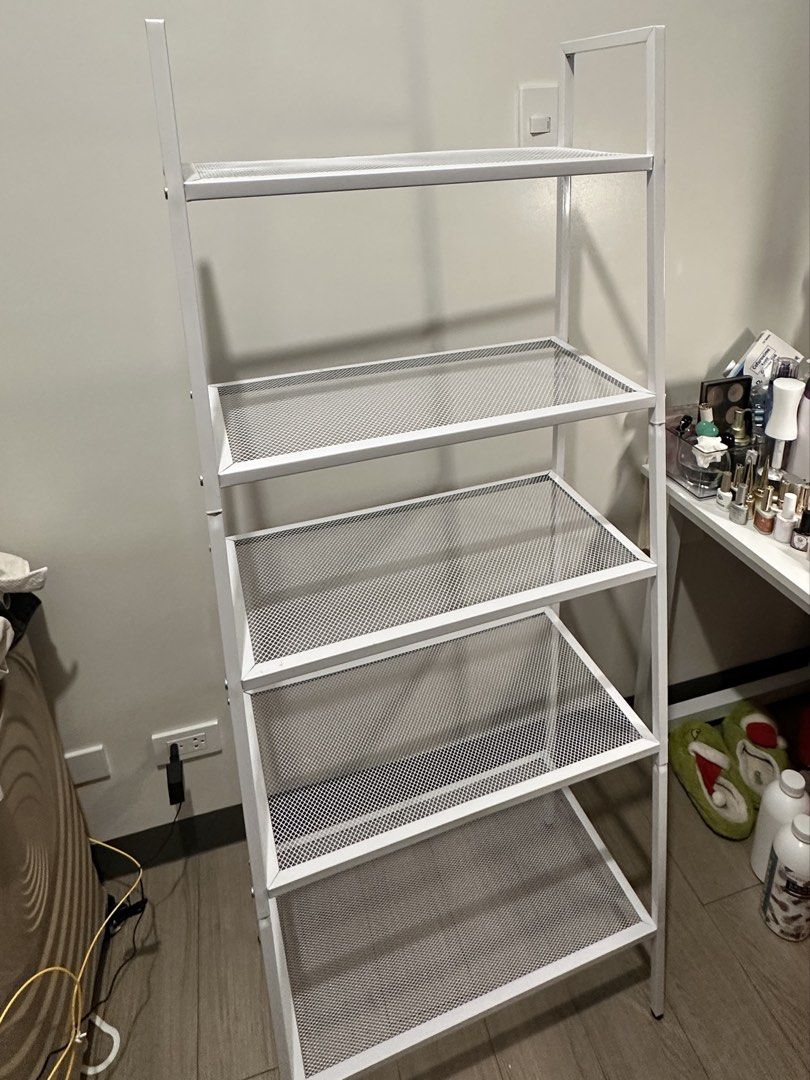 White 5-Tier Mesh Metal Storage Shelf Rack (Category: Shelves, Cabinets & Racks) located in Quezon City. Submitted by luc1enne (Listing ID 1467988807, Image 2). Description: - Recently bought - Capacity: 5 tiers for versatile storage - Condition: Clean surfaces, fully assembled - No damages.
