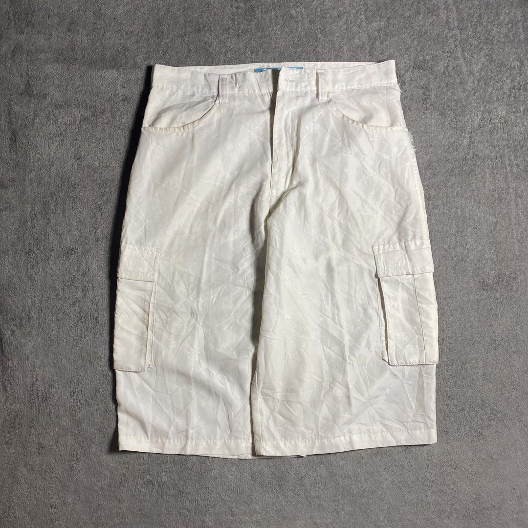White Cargo Shorts with All-Over Monogram Pattern (Category: Shorts) located in Manila. Submitted by thrifturfit_star (Listing ID 1467862307, Image 1). Description: - Color: White with subtle all-over monogram pattern - Pockets: Multiple utility pockets including two side cargo pockets - Closure: Standard button and zipper fly with belt loops - Material: Lightweight and breathable fabric - Style: Perfect for warm weather streetwear looks - Condit