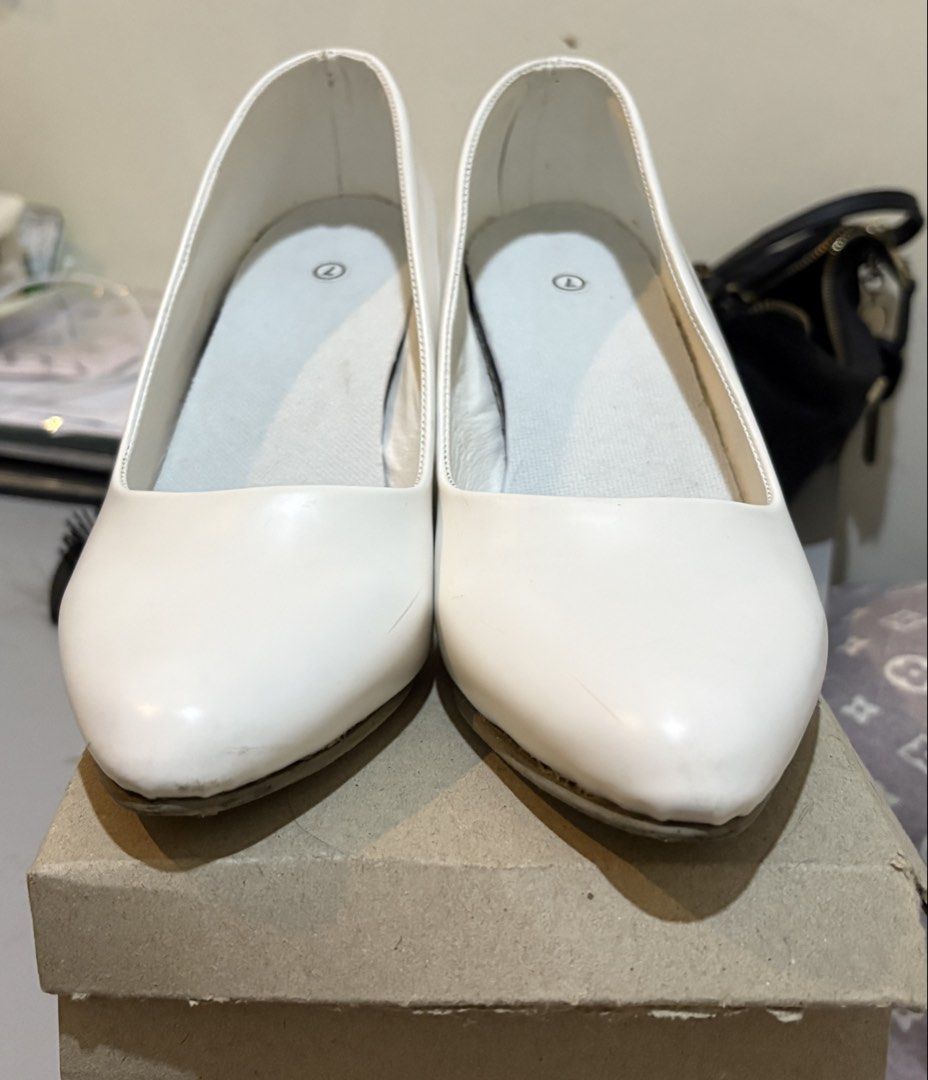 White Chunky Block Heel Pumps Shoes Size 7 (Category: Heels) located in Manila. Submitted by shannelbozar (Listing ID 1467959659, Image 3). Description: 👠 FOR SALE: WHITE LEATHER HEELS 🤍 ✨ ₱700 ONLY! ✨ • White leather 2-inch heels • Marikina-made 🇵🇭 • Only used twice! • In good condition 💗 • Size 7 • Perfect for events, graduation, oath-taking, and other formal occasions! • Price Negotiable for Sure Buyer! 📍 MOP: Payment first for Lalamove 