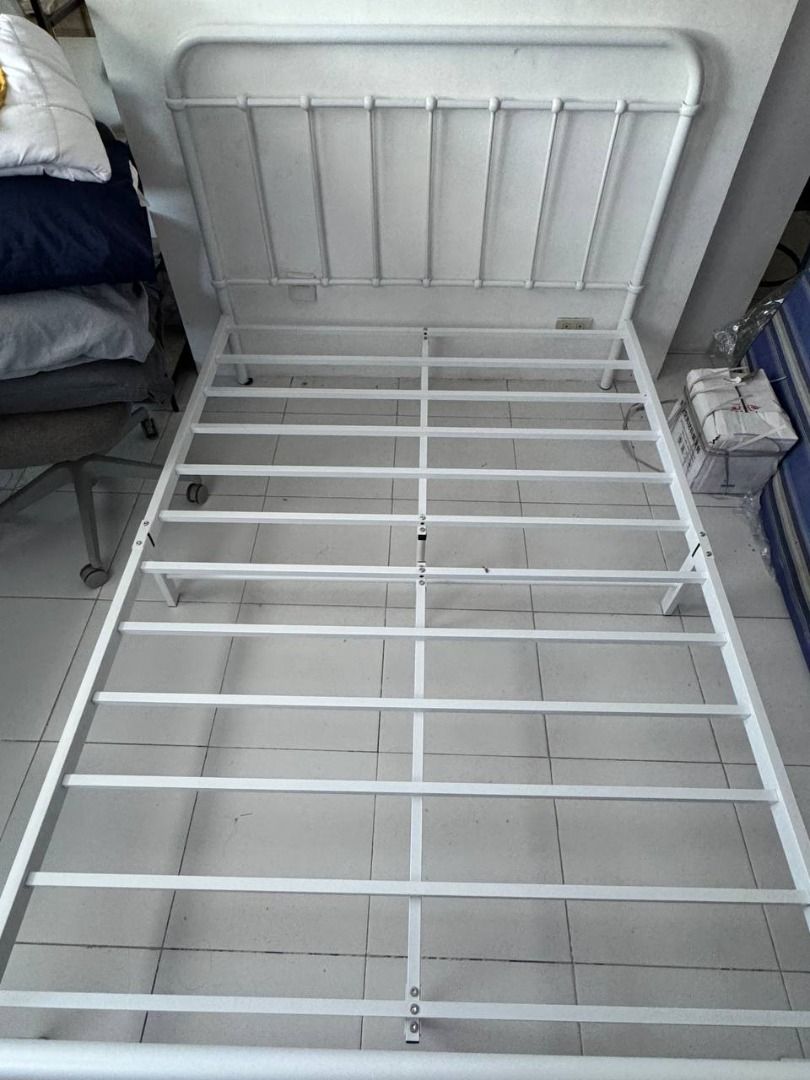 White Metal Bed Frame with Headboard (Category: Bed Frames & Mattresses) located in Binan City. Submitted by francisgavin21 (Listing ID 1467920702, Image 2). Description: Mandaue Foam Kumi White Metal Bed Frame | Semi-Double | Preloved Selling Price: ₱3,500 (Negotiable) Condition: Lightly used Purchased: June 2026 Used for: 3 months only Product Details: • Brand: Mandaue Foam • Model: Kumi White Metal Bed Frame • Size: Semi-Double • Clean white m