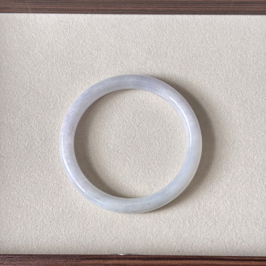 White Moonlight Lavender Type A Jadeite Jade Bangle 52.7mm (Category: Bracelets) located in Pasig City. Submitted by bleuvelyatelier (Listing ID 1467938955, Image 2). Description: -Authentic Burmese Jadeite -Type A -Moonlight white base and very faint lavender color -Glutinous texture -Slim full round style -inner diameter: 52.7mm -width:7mm -This bangle has natural stone line -comes with certificate Payment via GCash or Bank Transfer.