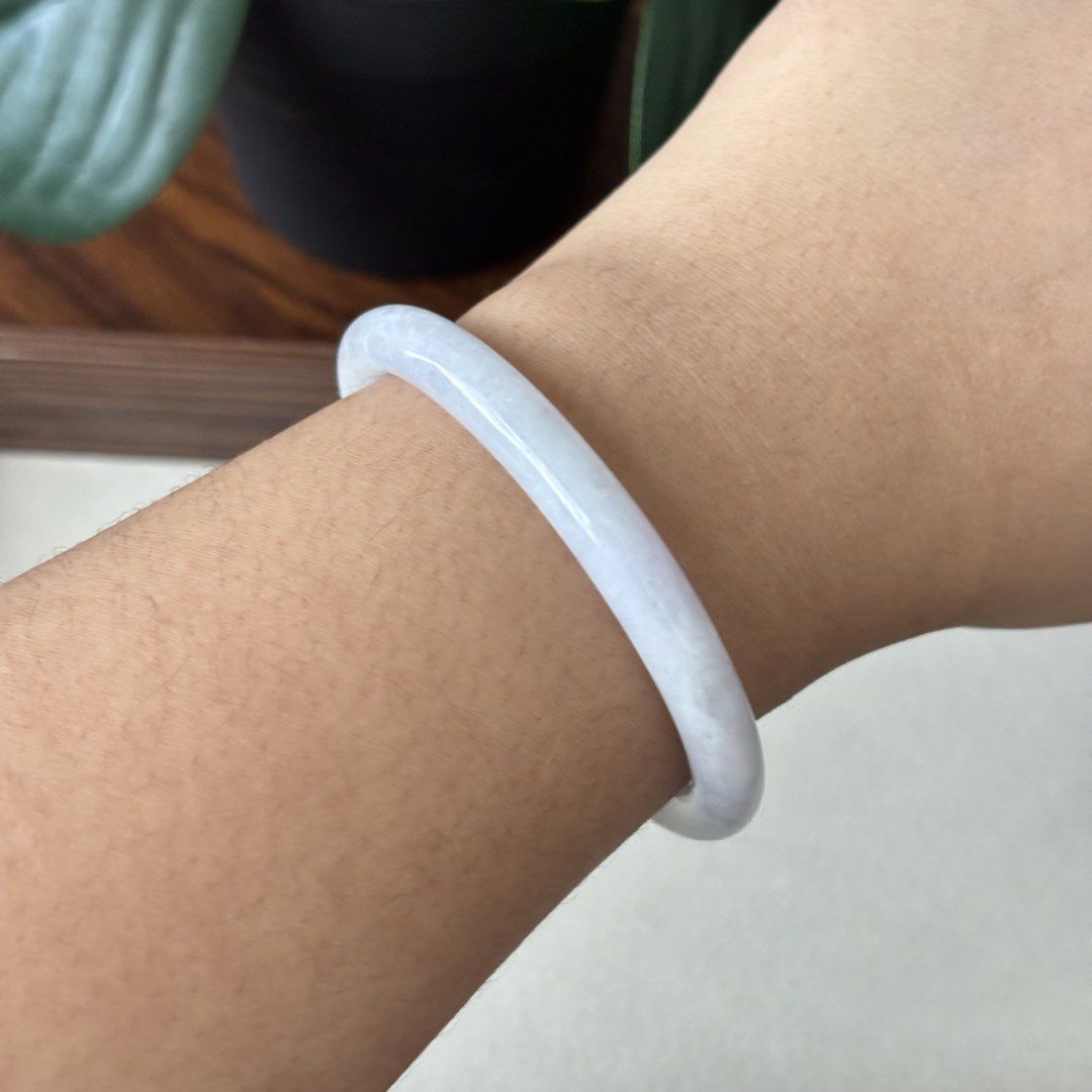 White Moonlight Lavender Type A Jadeite Jade Bangle 52.7mm (Category: Bracelets) located in Pasig City. Submitted by bleuvelyatelier (Listing ID 1467938955, Image 3). Description: -Authentic Burmese Jadeite -Type A -Moonlight white base and very faint lavender color -Glutinous texture -Slim full round style -inner diameter: 52.7mm -width:7mm -This bangle has natural stone line -comes with certificate Payment via GCash or Bank Transfer.