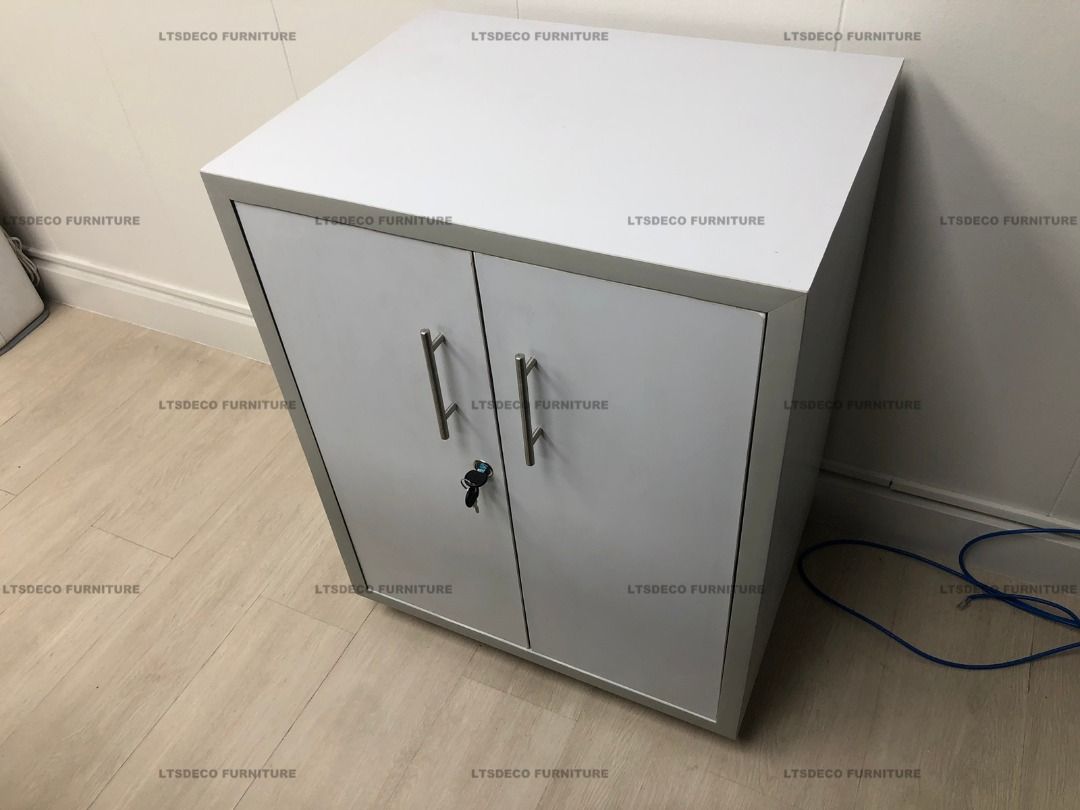 White office cabinet with double doors and shelf (Category: Office Furniture & Fixtures) located in Paranaque City. Submitted by alexa_ltsdeco (Listing ID 1467890313, Image 1). Description: For inquiry, Quotation, estimate and orders please call us for faster transaction or kindly send your floor plan layout via email: Look for Ms. Anne -Sale's Executive- 📞 V I B E R NUMBER - 09318363986 📩 Email: roxanne25.ltsdecofurniture(at)gmail.com 🌐 VISIT