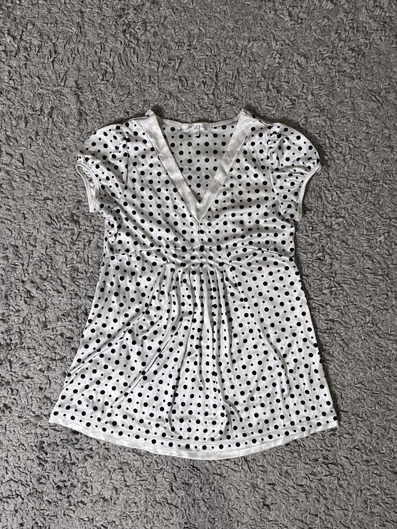white polka-dotted blouse (Category: Blouses) located in Davao. Submitted by fromadollscloset (Listing ID 1467844795, Image 1). Description: [READ MY BIO FIRST!] ⭐️ description ⭐️ - material: silk - ruched near chest area - slightly-puffed sleeves.