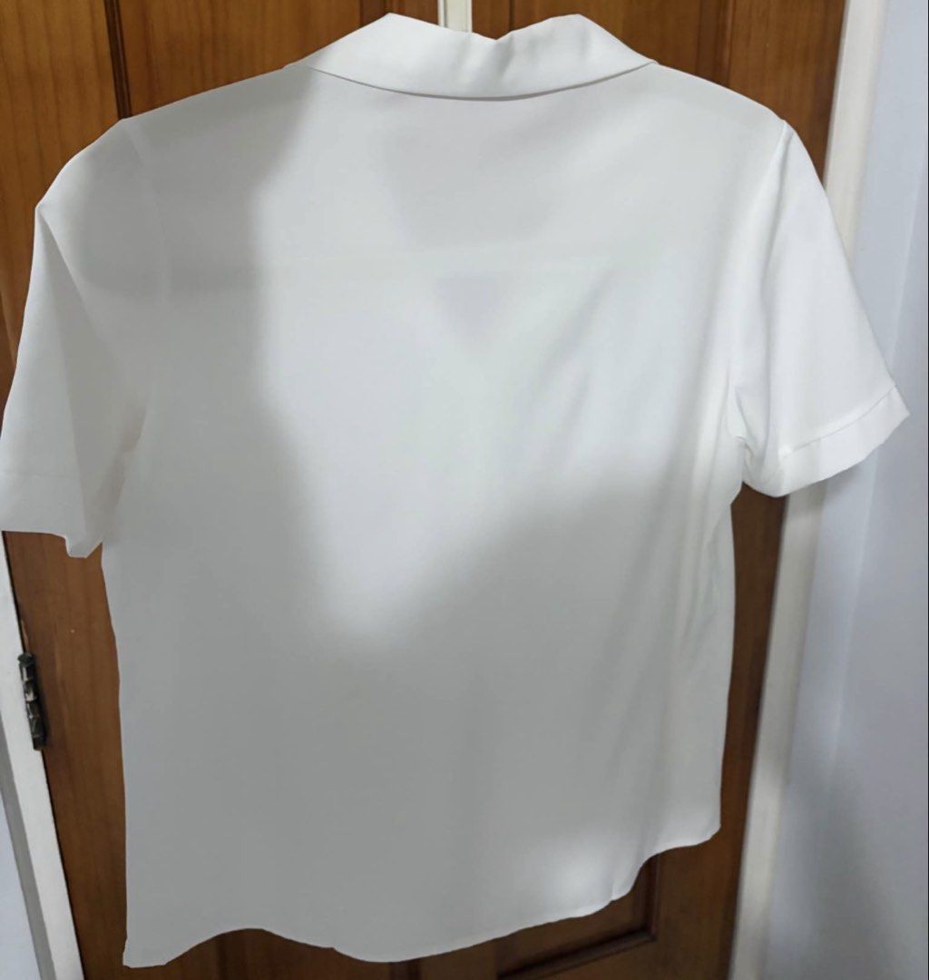 White Polo Blouse (Category: Blouses) located in Cainta. Submitted by michaelalin (Listing ID 1467883584, Image 3). Description: White Polo Blouse Brand New (Not Worn) Can fit to Medium to semi large Cainta area Lalamove (sf shoulder by buyer).