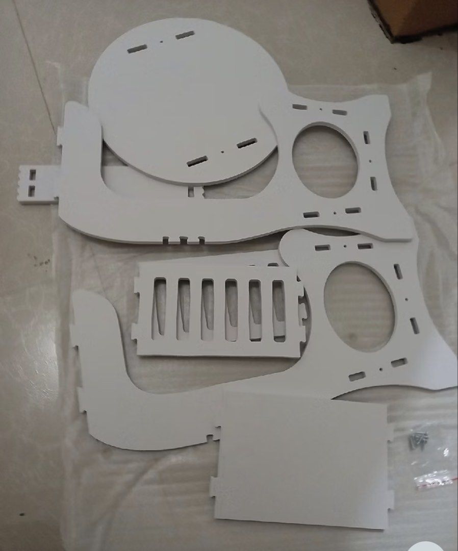 White round bedside table with magazine rack (Category: Tables & Sets) located in Manila. Submitted by kween_kweeny03 (Listing ID 1468052073, Image 3). Description: - SET of 2 (ALL IN PACKAGE) - Multi-purpose side table with a built-in bottom magazine holder - Round top surface ideal for drinks and small decor - Slatted basket design to keep books and reading materials organized - Compact profile, perfect beside a sofa or bed - Flat-packed in a c
