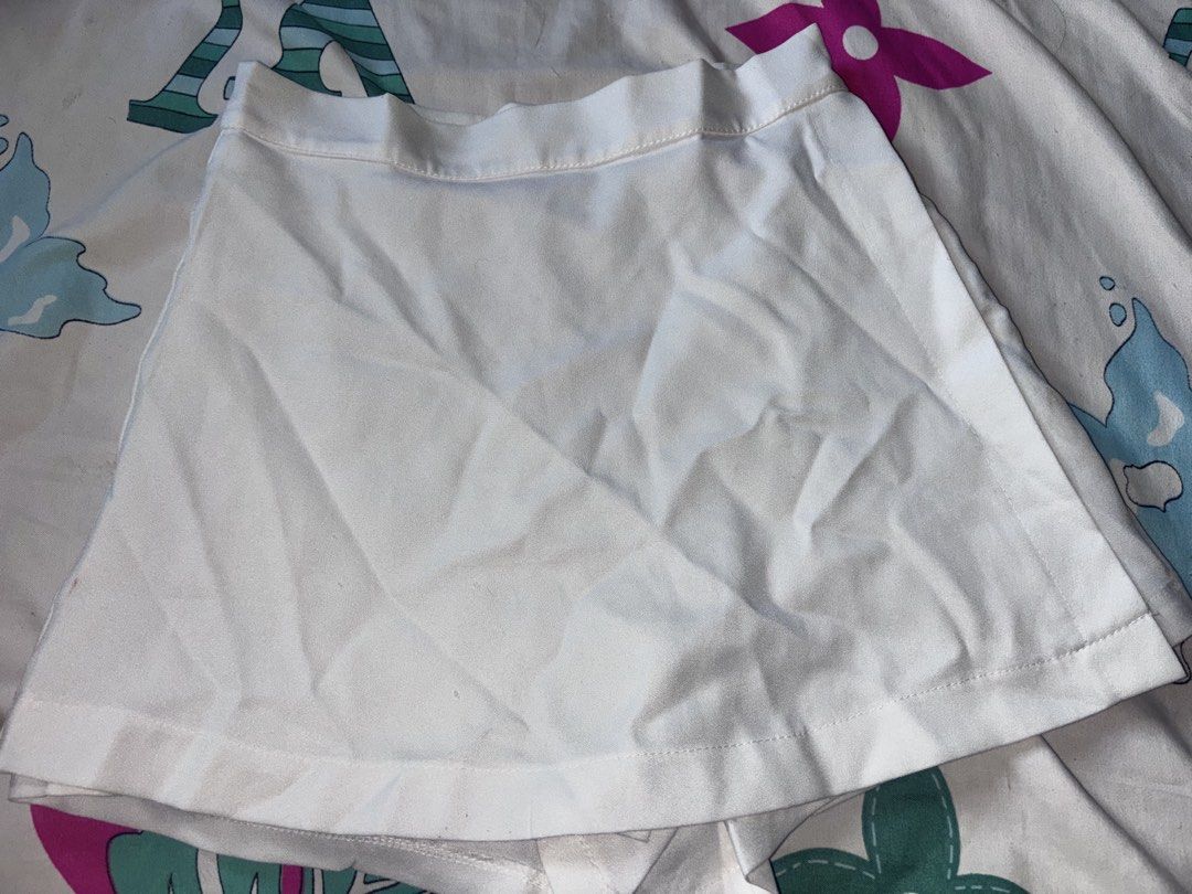 White Skort Athletic Skirt Shorts (Category: Shorts) located in Bacoor. Submitted by fmax19 (Listing ID 1467902078, Image 1). Description: - Color: Plain White - Style: Athletic skort with built-in shorts underneath - Fit: High waist with a comfortable elastic band - Size: Extra Small to Small.