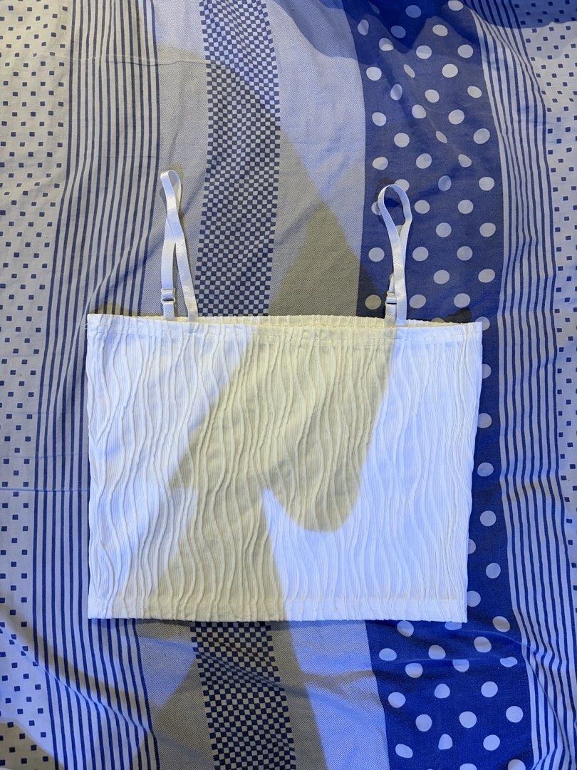 White textured two piece top and cami set (Category: Sets or Coordinates) located in Silang. Submitted by tskym00 (Listing ID 1468030733, Image 2). Description: Bought from our 2025 taiwan trip never been used RFS: stuck in closet can fit S-M can send more pics/vids :)).