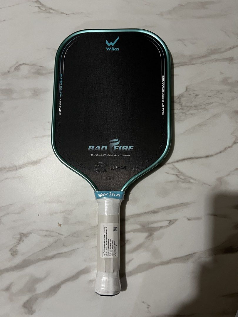 Wika Bao Fire 2 (Teal) (Category: Racket and Ball Sports) located in Manila. Submitted by r1tan (Listing ID 1467941886, Image 1). Description: Brand New Wika Bao Fire 2 (Teal) - P5800 - Brand new, never used - Free overgrip and PPF edge tape - Free SF within Metro Manila, can do 50/50 split LBC COD if outside RFS: Change of mind.