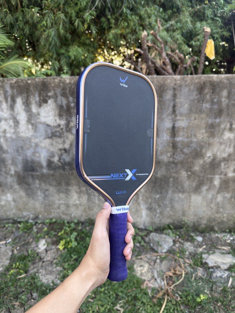 Wika Next X (Category: Racket and Ball Sports) located in San Fernando. Submitted by marcsarmac20 (Listing ID 1467930515, Image 3). Description: ❗️FOR SALE❗️ · Wika Next X · Metallic Purple · With Extra Overgrip · With Bag · 6k Only La Union Can Do Shipping.