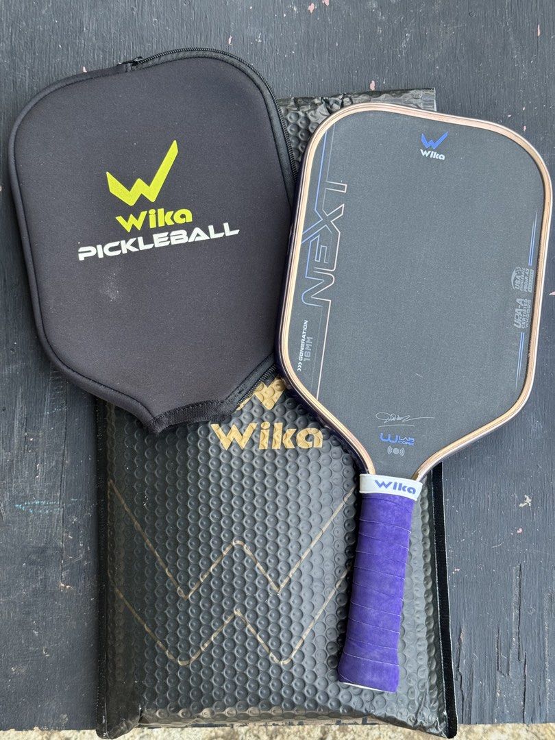 Wika Next X (Category: Racket and Ball Sports) located in San Fernando. Submitted by marcsarmac20 (Listing ID 1467930515, Image 2). Description: ❗️FOR SALE❗️ · Wika Next X · Metallic Purple · With Extra Overgrip · With Bag · 6k Only La Union Can Do Shipping.