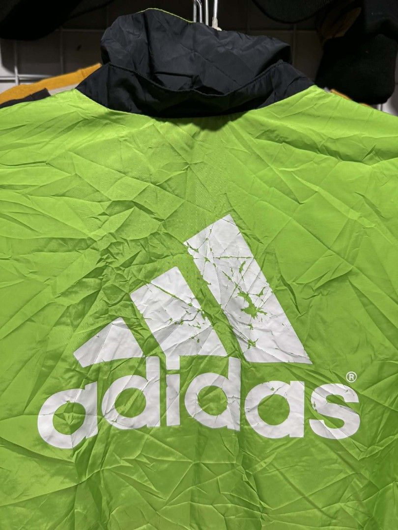 Windbreaker (Category: Coats, Jackets and Outerwear) located in Bulacan. Submitted by ukaybrandedshop (Listing ID 1467877838, Image 3). Description: ADIDAS WINDBREAKER JACKET - LEGIT 💚🖤 Brand: Adidas (Legit) Size: 164 on tag - Fit S-M Adult / Unisex Dimes: 21W x 26L - Best fit Small to Medium Material: 100% Polyester - Lightweight / Windproof Condition: 8/10 Issue: May crack print sa likod logo (kita sa pic) + need laba lang - bukod dun no buta