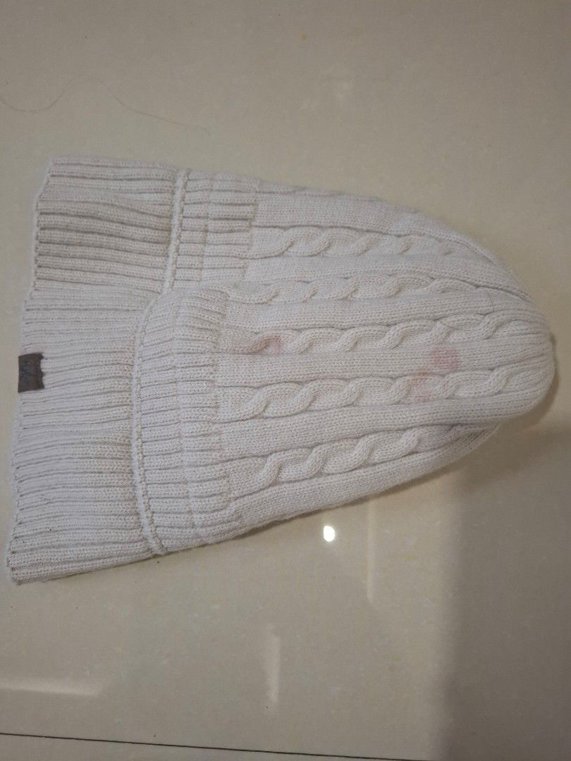 Winter Knit Beanies Set Grey and White (Category: Hats & Beanies) located in Imus. Submitted by maggieforce (Listing ID 1467869642, Image 3). Description: -personal preloved - Set of 2 chunky cable knit beanies: 1 grey and 1 off-white - Features a cozy ribbed cuff and a stylish brown leather-look front patch - Thick and warm material, perfect for cold weather - Selling as a bundle - Flaw: The off-white beanie has noticeable reddish stains near th