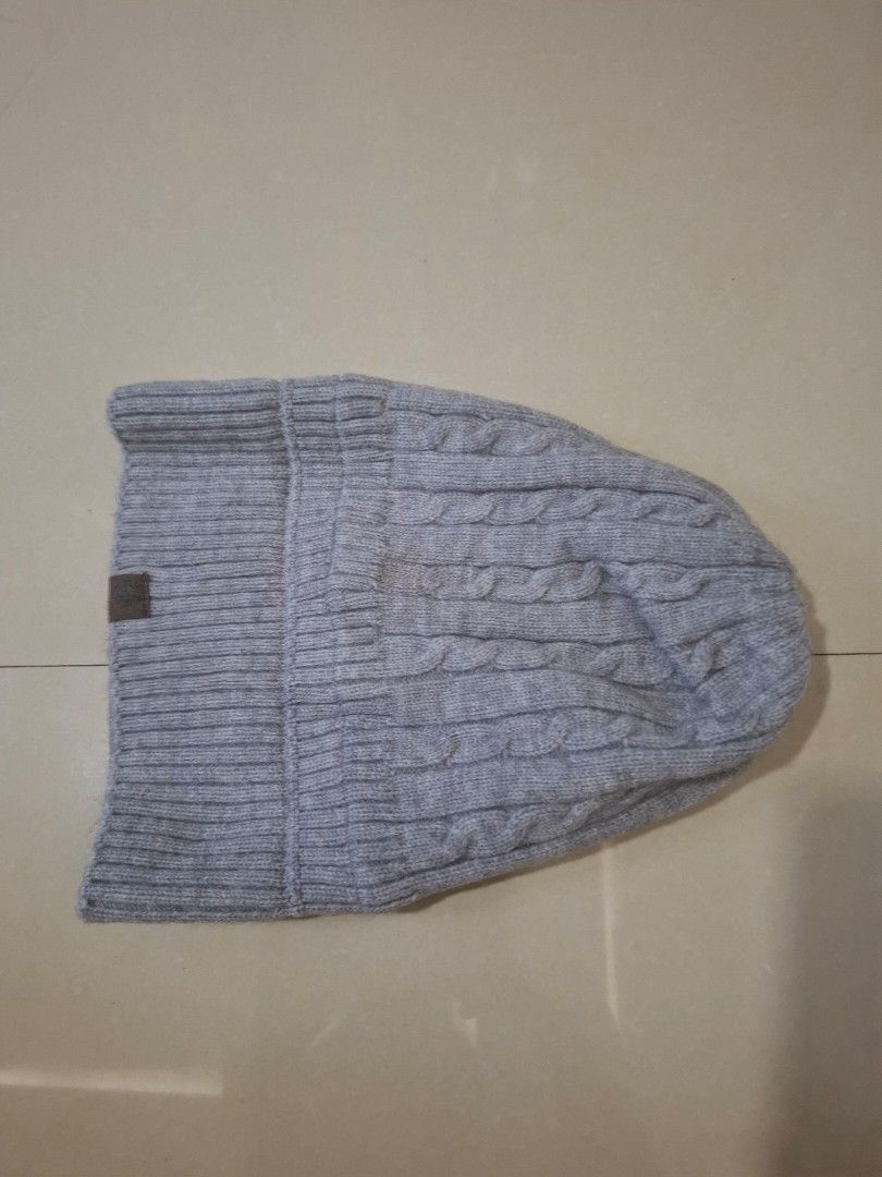 Winter Knit Beanies Set Grey and White (Category: Hats & Beanies) located in Imus. Submitted by maggieforce (Listing ID 1467869642, Image 2). Description: -personal preloved - Set of 2 chunky cable knit beanies: 1 grey and 1 off-white - Features a cozy ribbed cuff and a stylish brown leather-look front patch - Thick and warm material, perfect for cold weather - Selling as a bundle - Flaw: The off-white beanie has noticeable reddish stains near th