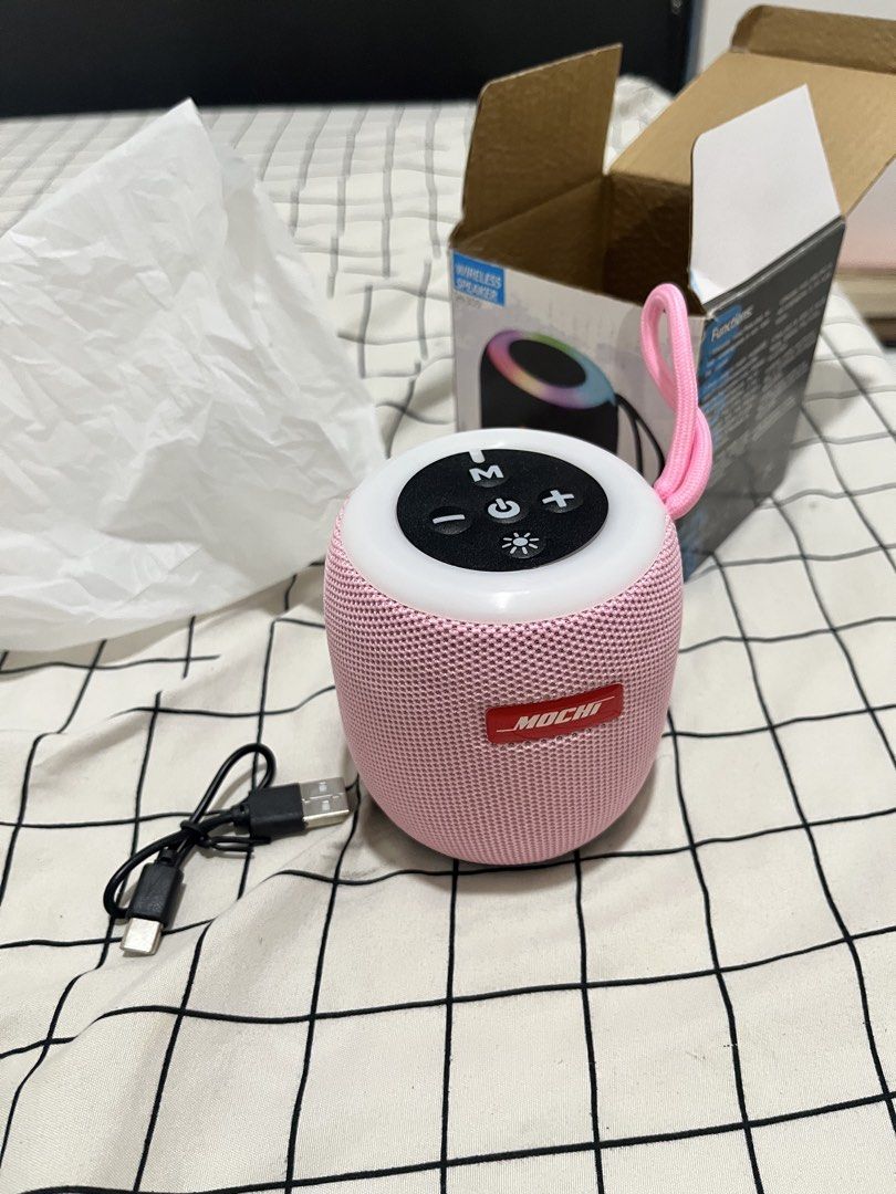 Wireless Bluetooth Speakers Pink (Category: Soundbars, Speakers & Amplifiers) located in Quezon City. Submitted by tradingcardsandmore (Listing ID 1467843372, Image 1). Description: - Model: Mochi SH-309 Wireless Speaker - Color: Cute Pink - Design: Compact and portable with a convenient carrying strap and top control buttons - Lighting: Fun LED lighting effect around the top rim - Condition: Clean inside and out - Inclusions: Original box and ch