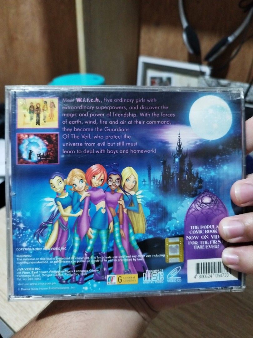 W.I.T.C.H. The First Three Episodes VCD (Category: CDs & DVDs) located in Davao. Submitted by evanbolo24 (Listing ID 1467845127, Image 3). Description: - Title: W.I.T.C.H. Animated Series VCD - Content: Contains the first 3 episodes - Release: Official Viva Video release (2007) - Inclusions: Original plastic jewel case, cover art insert, and VCD disc - Condition: Case has a cracked top left corner with tape reinforcement; disc and insert are incl