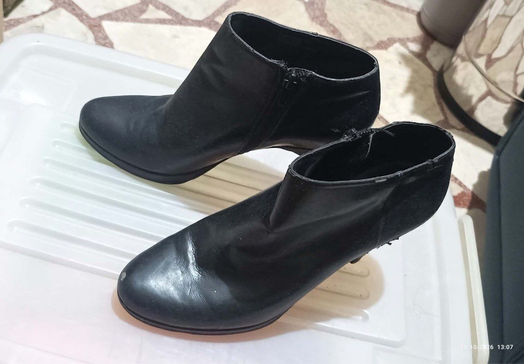 Women’s Ankle Boots/Booties (Category: Heels) located in Taytay. Submitted by crisha14344 (Listing ID 1467874450, Image 1). Description: Kayo na mag-price kita naman sa photos issues Nya Na-stock po Kc at nadaganan ng ibang shoes Size: 7.5 But outsole insole no problem po yan, kita naman sa pictures Ilang beses lang nagamit po talaga yan then stock lang talaga Zipper closure Medium heel Round-to-almond toe shape RFS: Declutter .
