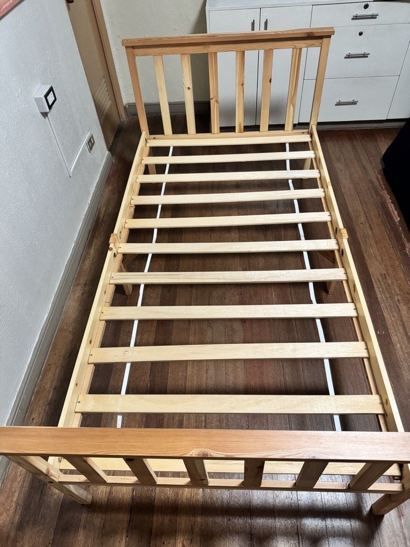 Wooden Single Bed Frame with Mattress (Category: Bed Frames & Mattresses) located in Makati City. Submitted by avic_c (Listing ID 1465179775, Image 3). Description: Available when not yet marked SOLD. Wooden single bed frame purchased from The Landmark Makati, with mattress included. Sturdy natural-wood frame with headboard, wooden slats and center support. In good used condition. Mattress has been kept covered and is also included in the price. 