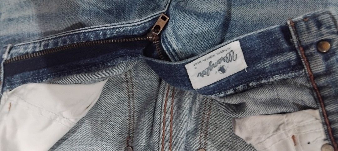 Wrangler Blue Bell Authentic Western Jeans Size 31 (Category: Jeans) located in Maasin. Submitted by cooleagle_3476d1 (Listing ID 1467888334, Image 2). Description: - Brand: Wrangler Blue Bell - Style: Authentic western jeans in light wash denim - Size: 31 (Waist: 78cm, Hips: 96cm based on inner tag) - Details: Classic leather patch, branded interior waistband, contrast stitching - Closure: Zipper fly with metal button - Condition: Excellent, rea
